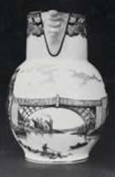 Caughley mask head jug showing the Ironbridge and probably made to commemorate the completion of the bridge in 1779.