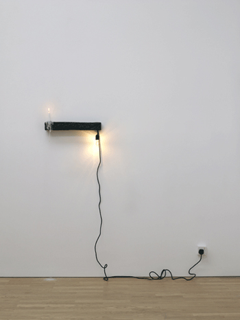Fig 6. Anders Ruhwald, ‘Candle/light’. Earthenware, Cord, Plug, Bulb, Socket, Candle, 2009. Image courtesy of mima.